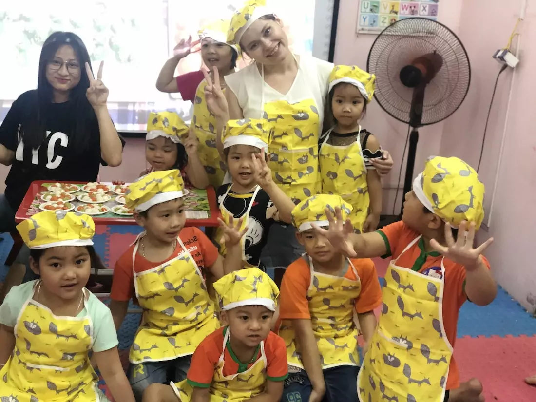 Alex at a cultural workshop with Vietnamese kids