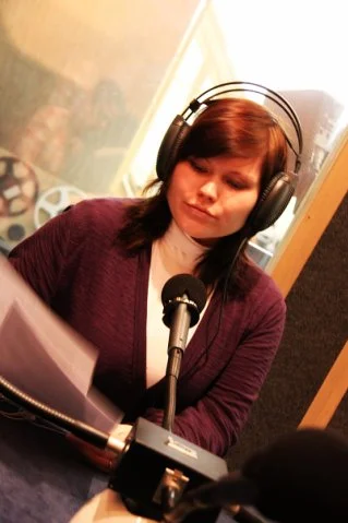 Alex in a radio show room